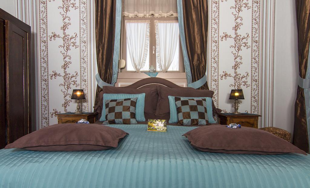 B&B De Vijf Zuilen Brugge Rom bilde